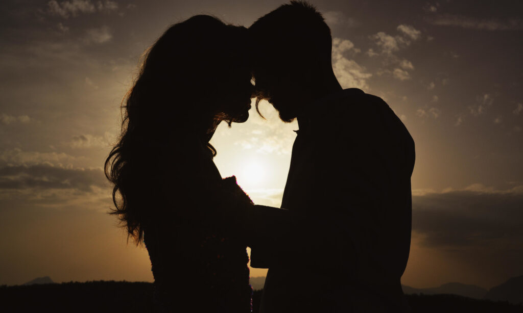 couple embracing outside practicing sacred sexuality
